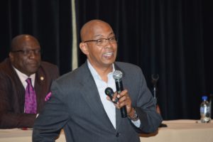 PM Harris and Dr Chitan at Crime Reduction Symposium