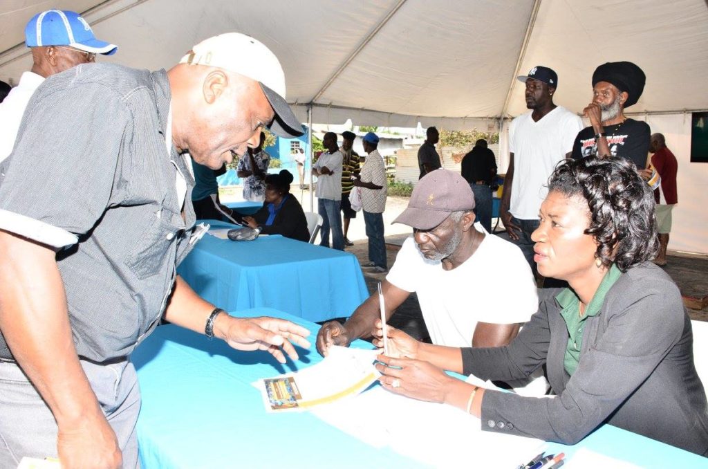 NHC Staff providing information to a prospective homeowner