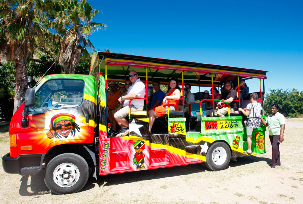 Cruise ship passengers on board an open-air safari experiencing the best of the what the destination has to offer.