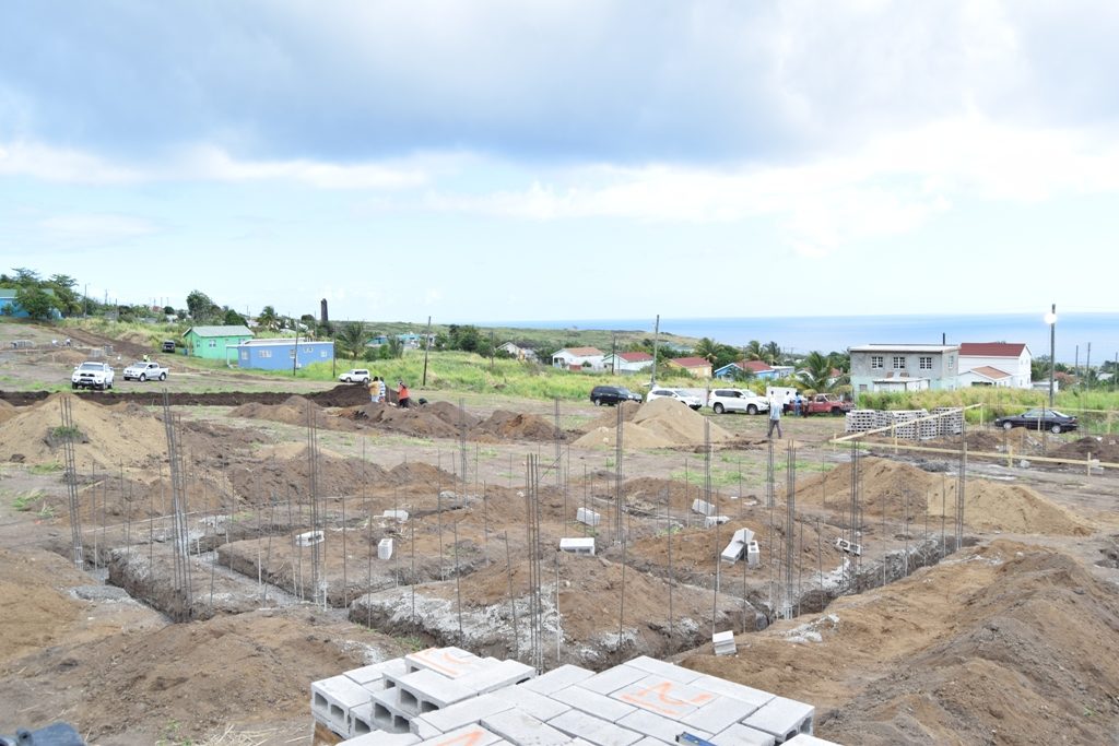 MINISTER HAMILTON REPORTS ON PROGRESS OF HOUSING PROJECT IN CAYON