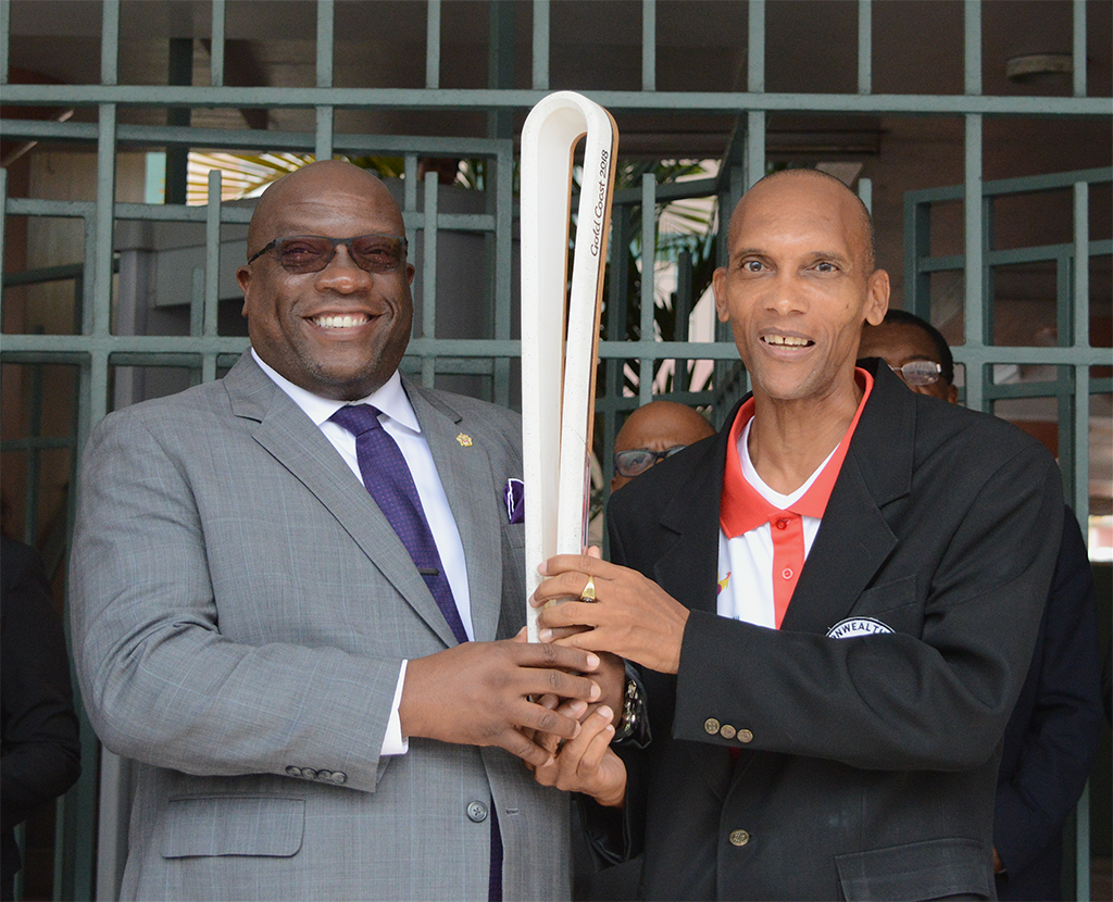 PM HARRIS AND CABINET COLLEAGUES RECEIVE QUEEN’S BATON AT GOVERNMENT HEADQUARTERS
