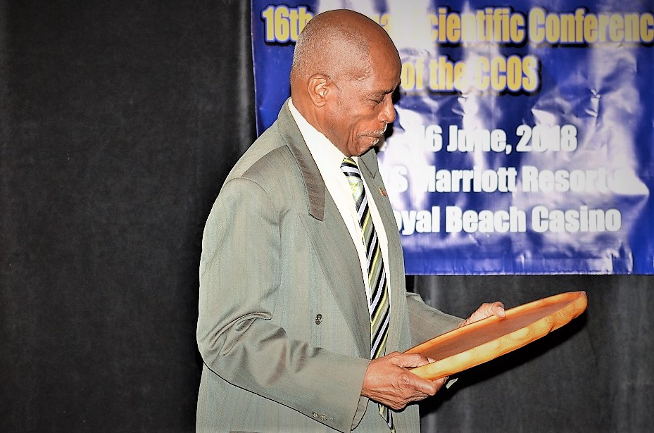 MEDICAL DOCTORS, DR. SIR KENNEDY SIMMONDS AND DR. DESMOND FOSBERY, HONOURED AT CCOS AWARDS BANQUET IN ST. KITTS