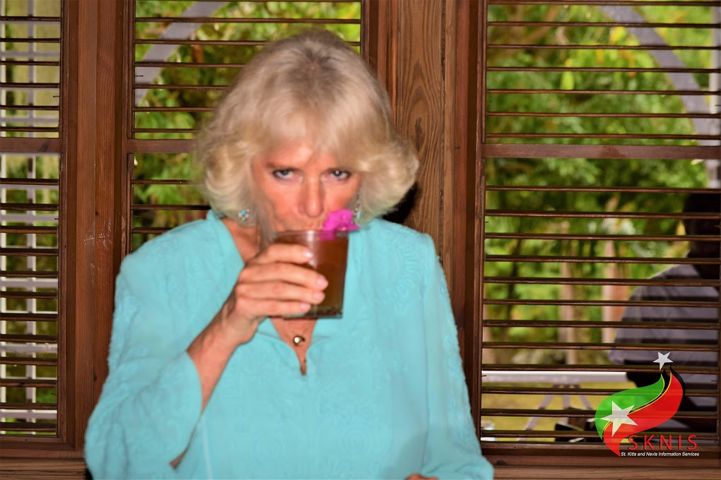 THE DUCHESS OF CORNWALL TREATED TO ROYAL RUM PUNCH AT THE HERMITAGE PLANTATION INN IN NEVIS