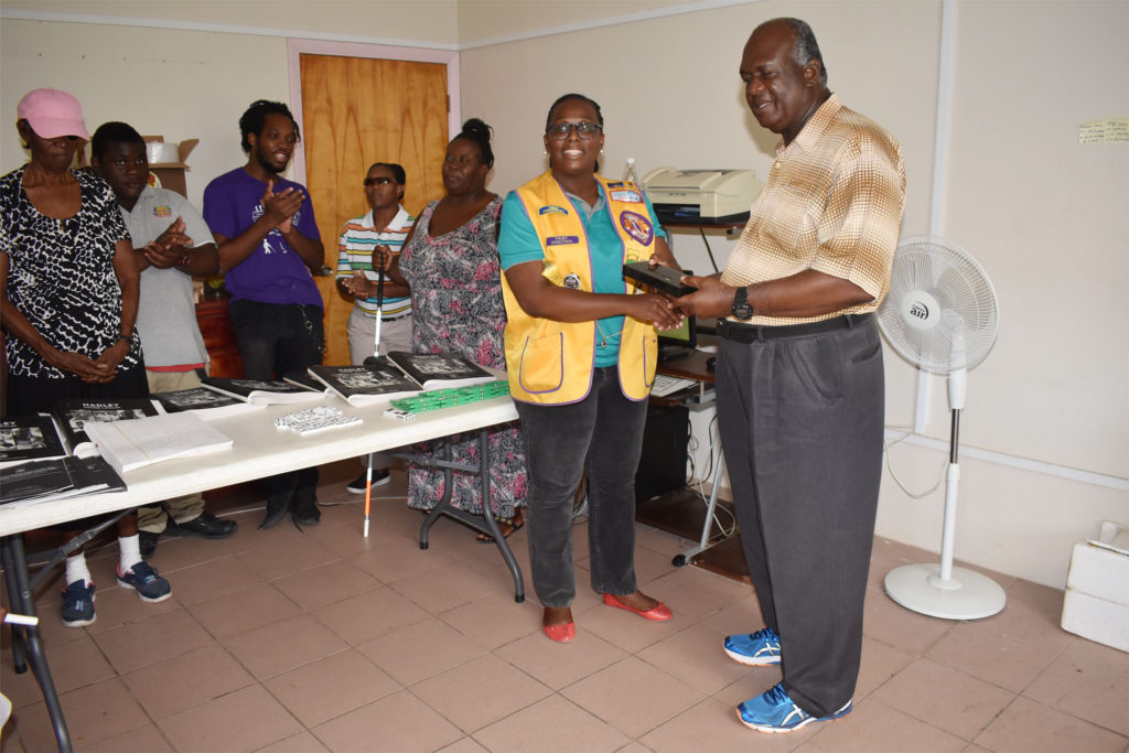 St. Kitts (Basseterre) Lions Club gifts braille items and white canes to St. Kitts Society for the Blind