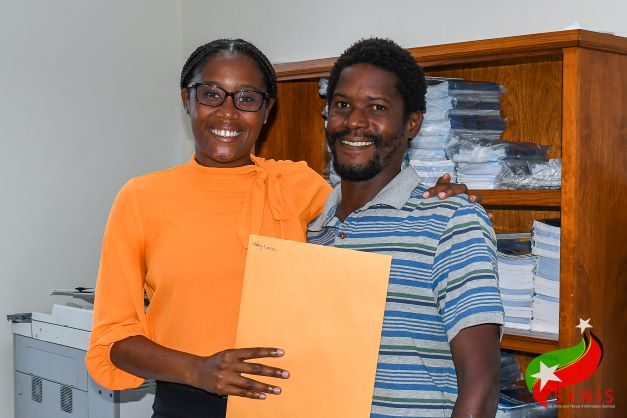 SEVEN RESIDENTS OF ABBOTS HOUSING DEVELOPMENT RECEIVE BLANK CERTIFICATES OF TITLE