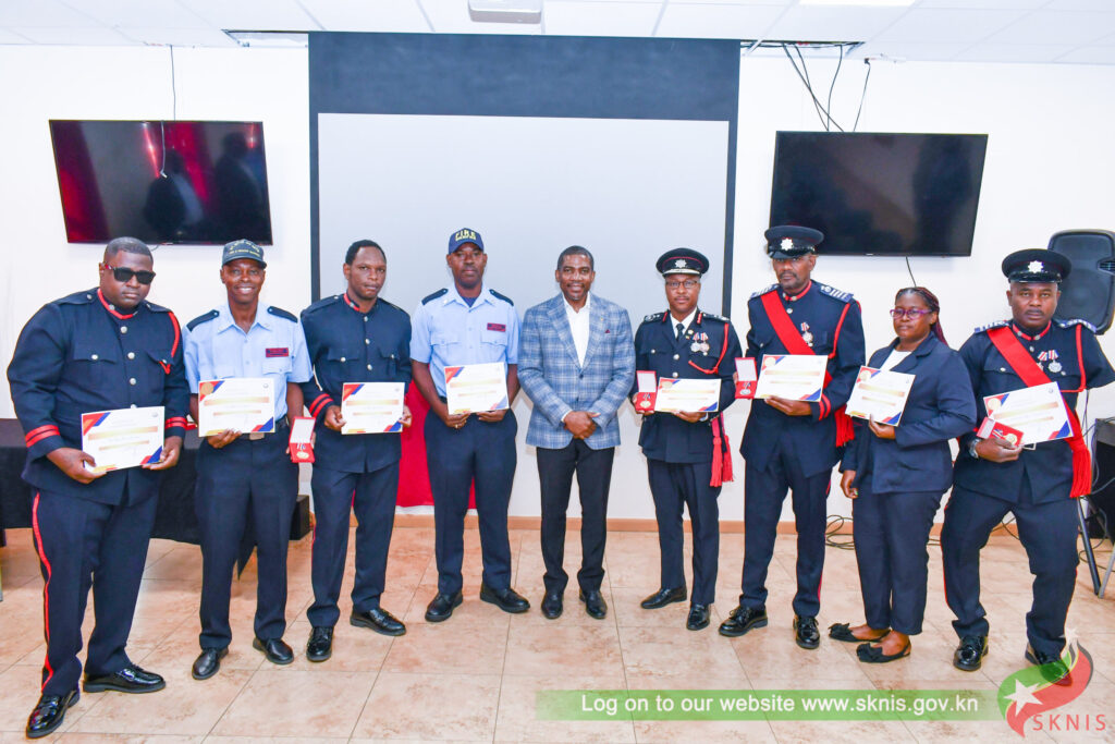 PM DREW JOINS SKNFRS IN SALUTING 11 OFFICERS FOR YEARS OF SERVICE AND SACRIFICE